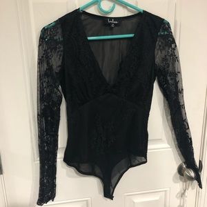 Lace body suit.